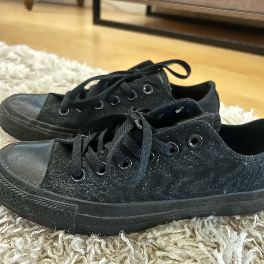 Blacked out Converse.